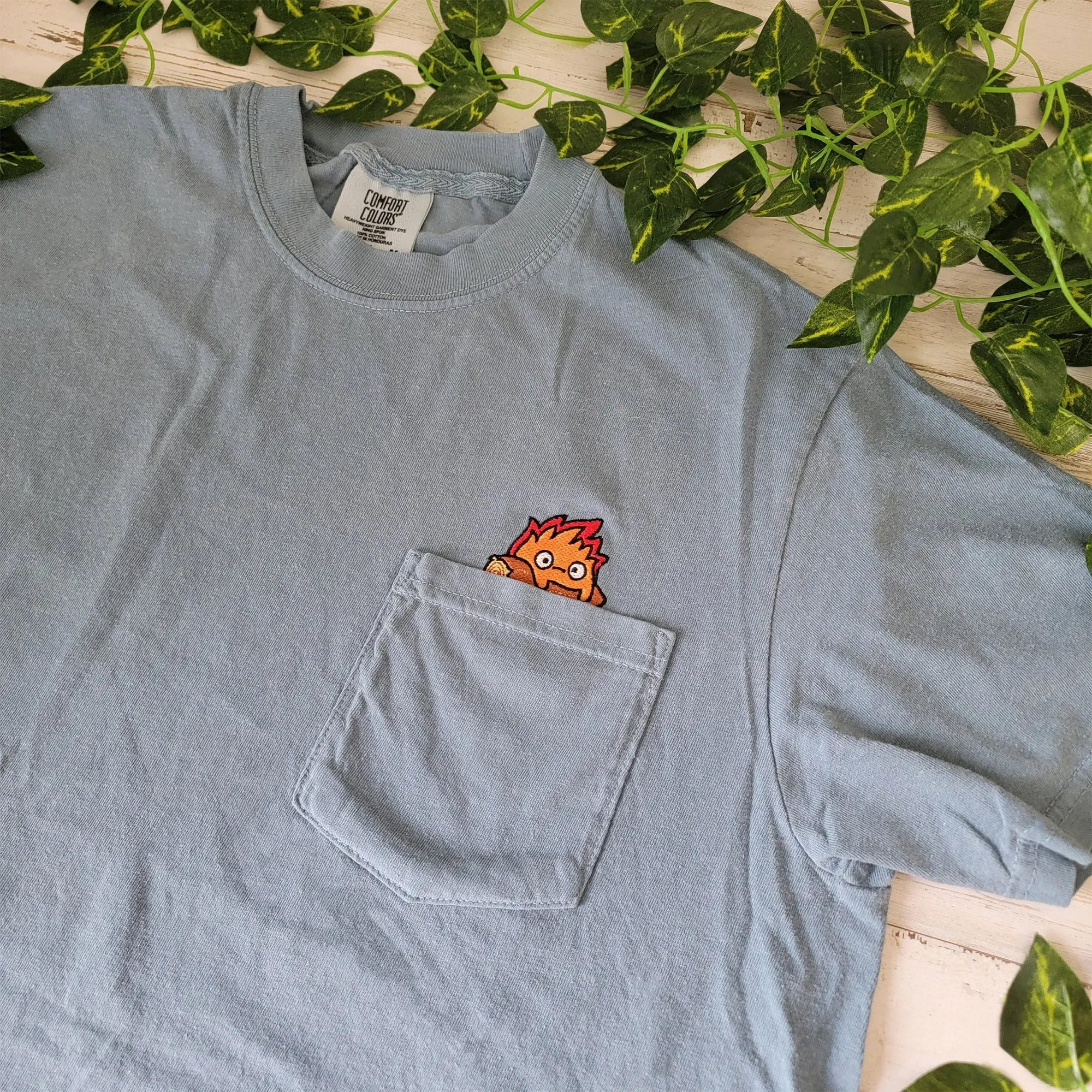Calcifer Yule Log Pocket Tee