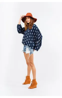 Indah Avery Solid Long Sleeve Button Back Top | Indigo/Diamond