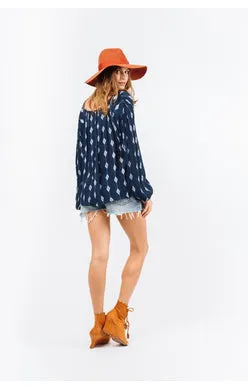 Indah Avery Solid Long Sleeve Button Back Top | Indigo/Diamond